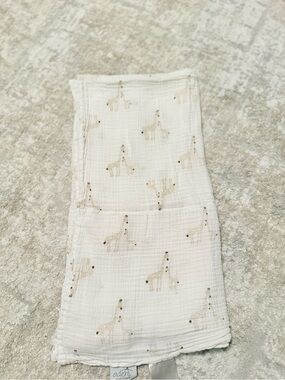 Aden white muslin swaddle blanket with giraffe print